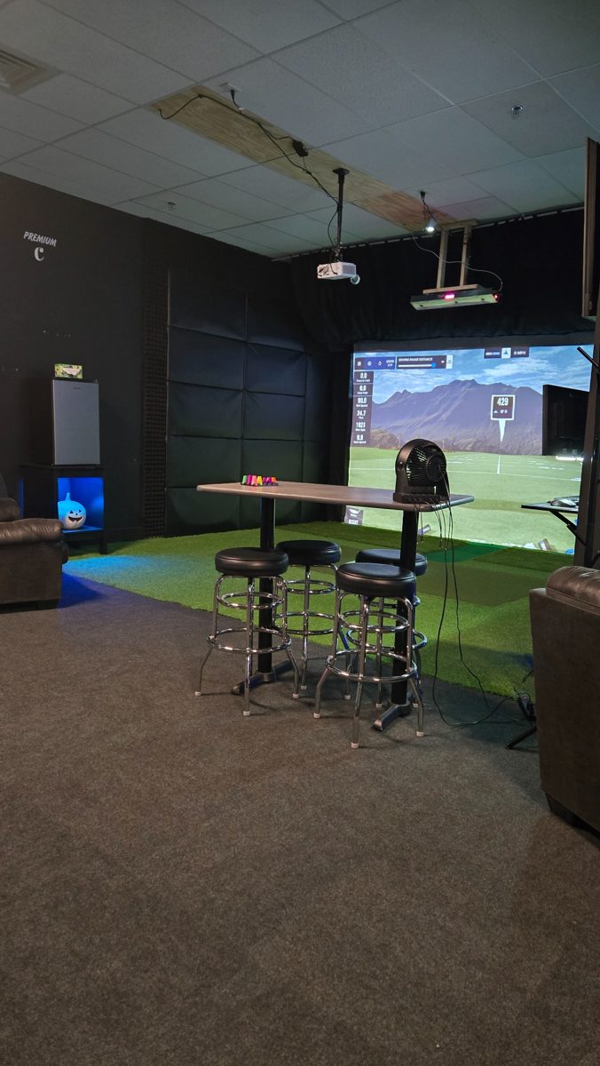 Premium suite simulator screen and bar seating